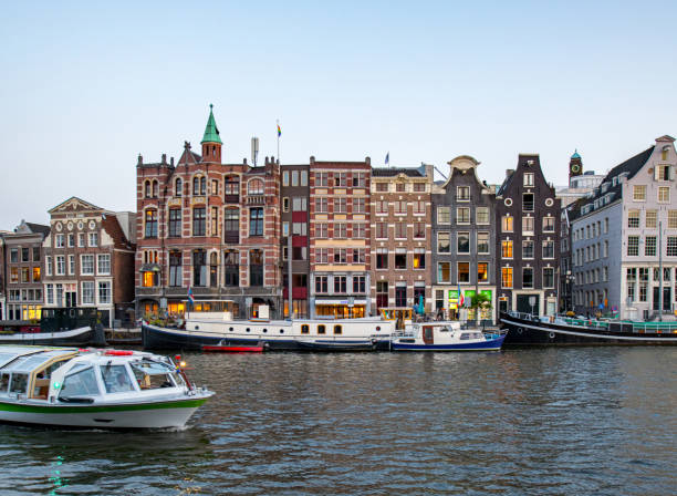 istock Amsterdam Canals with bridge and dutch houses, Netherlands 1462001345