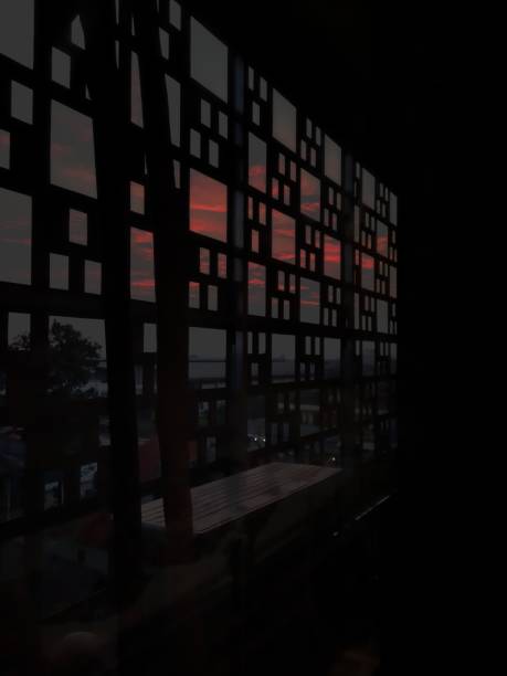 istock Silhouette photo of sunset from the window 1462015607