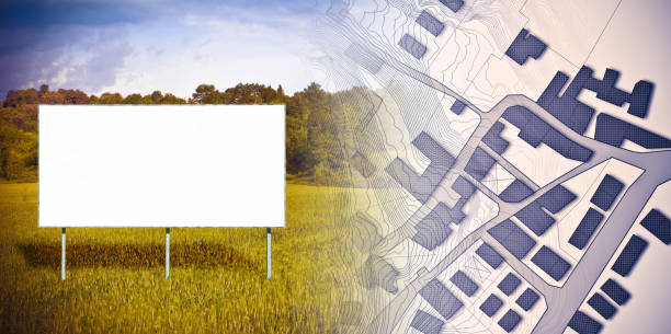 istock Blank advertising billboard with an imaginary cadastral map of territory with buildings, fields and roads - concept image with copy space 1462023144