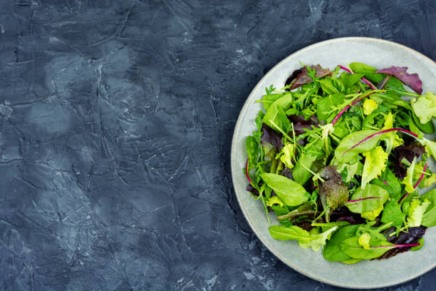 istock Fresh salad with mixed greens 1462023783