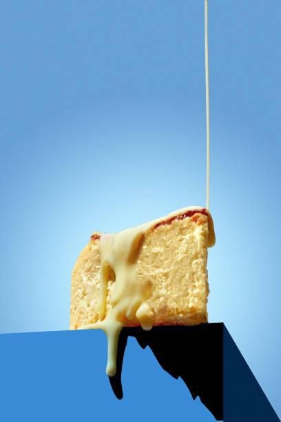 istock Basque cheesecake poured with sweet sauce on a blue background. Minimalist style with space for text 1462024752