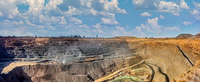 panoramic vista of an open pit  diamond mine in africa