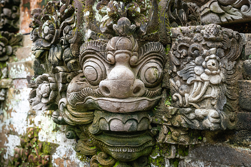 Traditional sculpture made of stone seen in the Bali island, Indonesia.