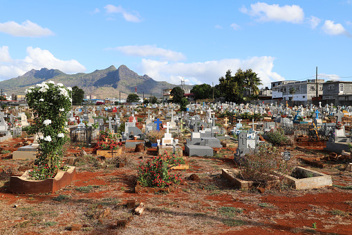 Petite Riviere, Mauritius - December 11, 2022: Graves at the cemetery of Petite Riviere in the West of Mauritius.