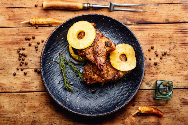 Roasted beef in fruit marinade, top view stock photo