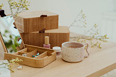 Modern still life at home jewelry box in wood make up and coffe cup