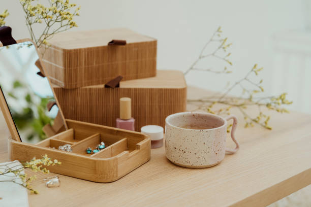 Modern still life at home jewelry box in wood make up and coffe cup stock photo