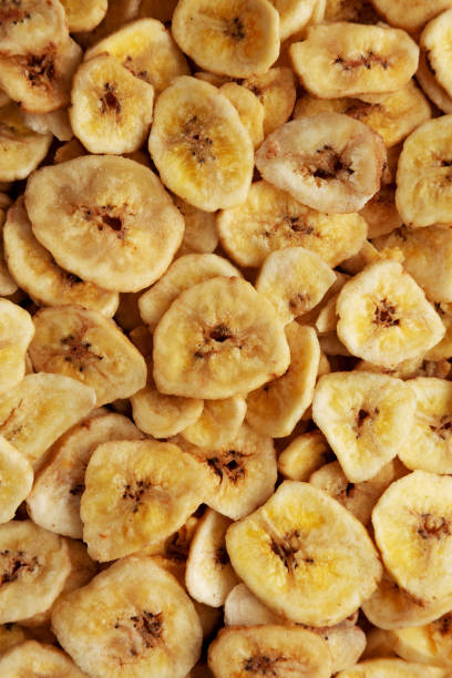 istock Homemade Banana Chips background, top view. 1462053138