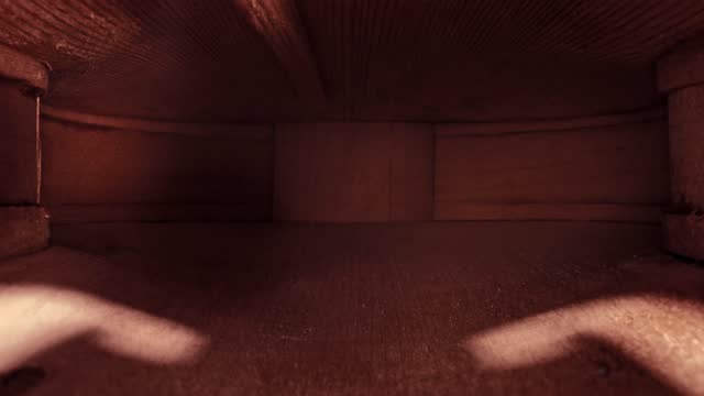 Interior of old wooden fiddle. Vintage violin view from inside.