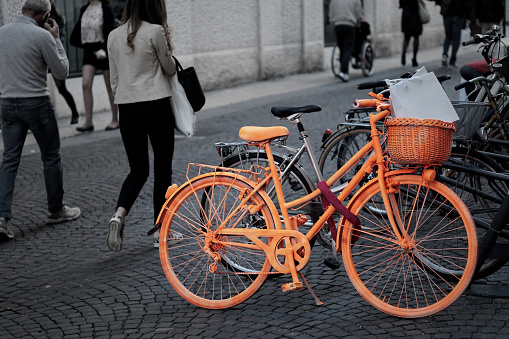 Verona, Italy - 26 06 2016. A colorful bicycle captures the attention on a cold, gray Verona. Happy lifestyle.