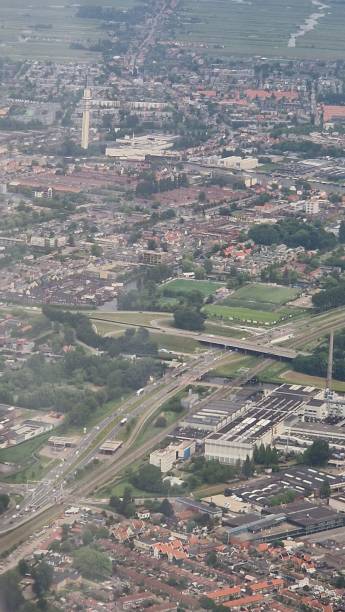 istock Vertical shot of a cityscape from airplane window 1462063044