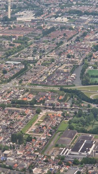 istock Vertical shot of a cityscape from airplane window 1462063047