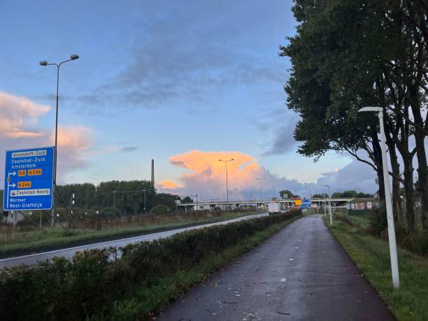istock Golden sunset in the sky over the over pass road 1462063578