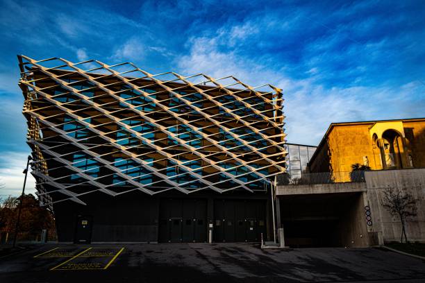 The Swiss Re - headquarters are located in Zurich (switzerland). Main Office Building opened 2017. The image shows the office building exterior (close-up) during summer season.