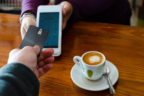 istock Payment of a coffee with a contacless card 1462069503