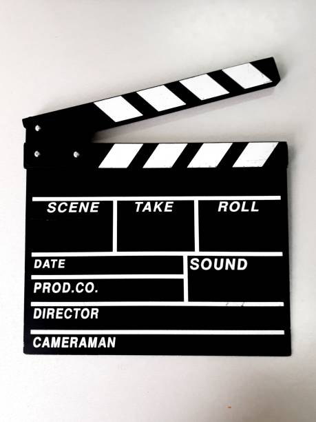 istock Vertical closeup of a clapperboard isolated on a white background. 1462072927