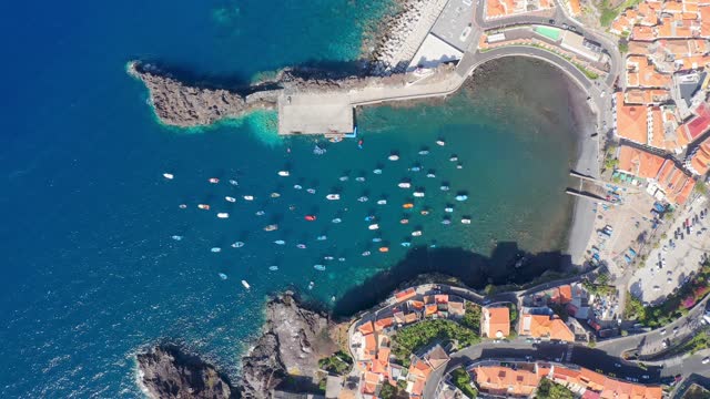 Aerial view of Camara de Lobos with boats on the harbor, Madeira Island, Portugal