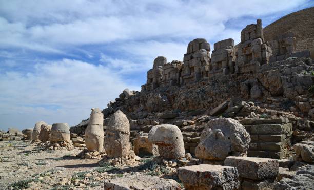 istock Ancient sculptures on Mount Nemrut with a blue sky in the background in Turkey 1462083824