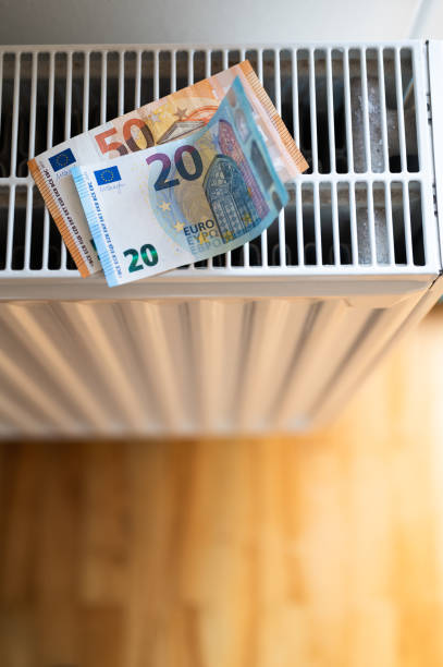 istock Euro paper money on heating radiator 1462089823