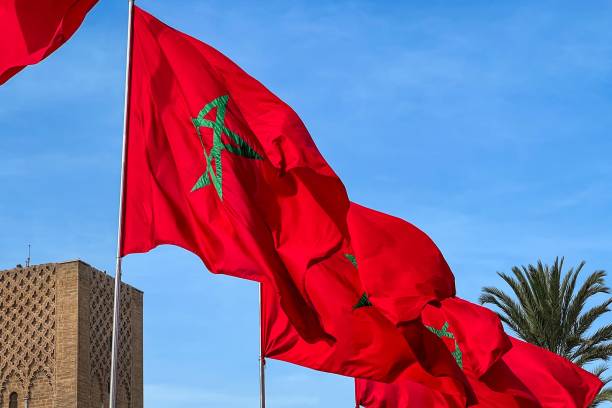 istock Moroccan flags fluttering and the Hassan tower in the background in Rabat 1462096467