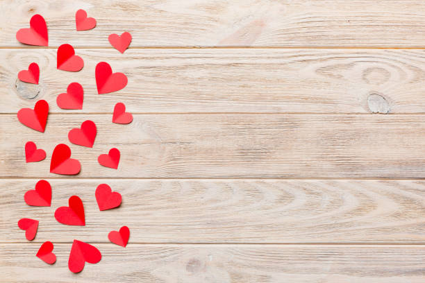 istock Valentine day background with red hearts, top view with copy space 1462097265