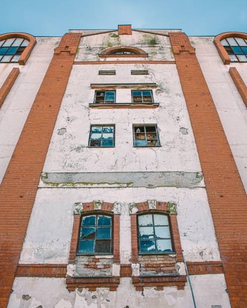 istock Low-angle vertical shot of the ancient old building with windows 1462101250