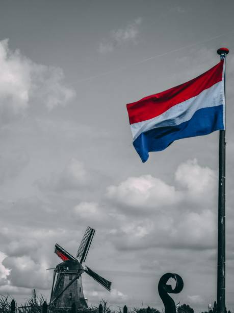 A vertical shot of a windmill in the Netherlands
