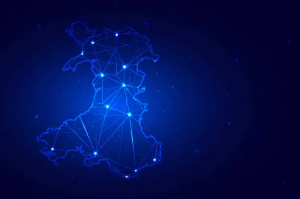 Vector illustration of Abstract Map of Wales from polygonal blue lines and glowing