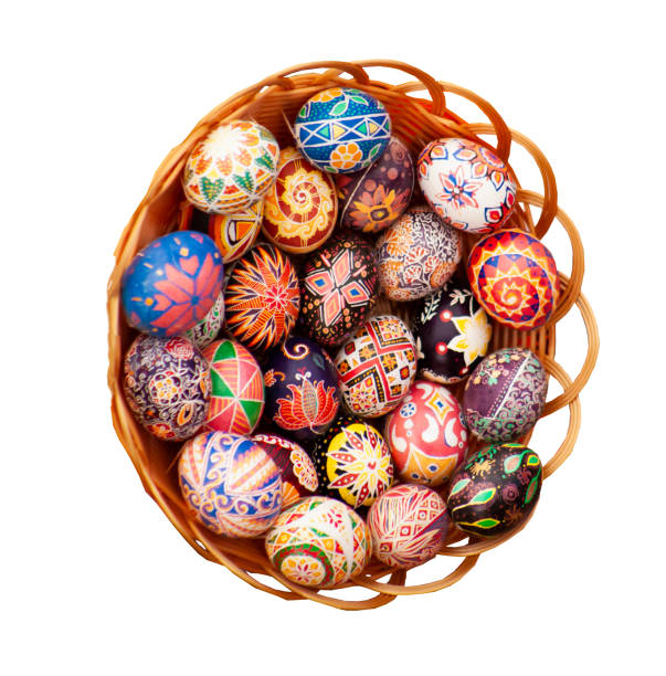 Easter eggs in a basket. Decorated Pysanka egg. Ukrainian symbol. stock photo