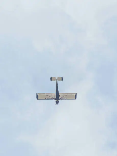 Small private propeller airplane in the sky