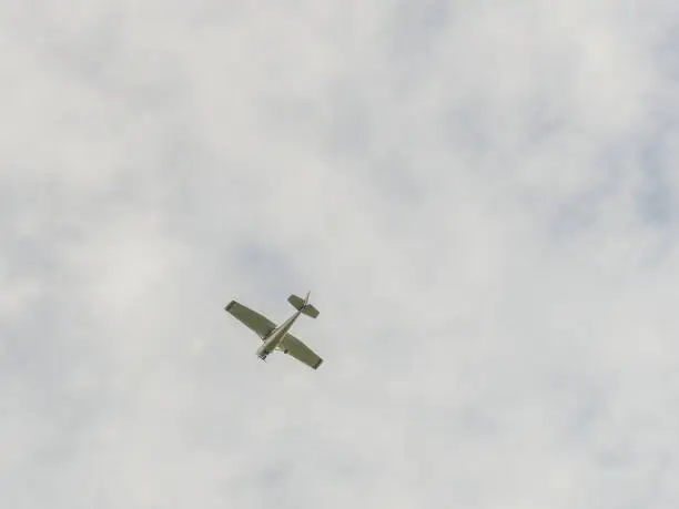 Small private propeller airplane in the sky