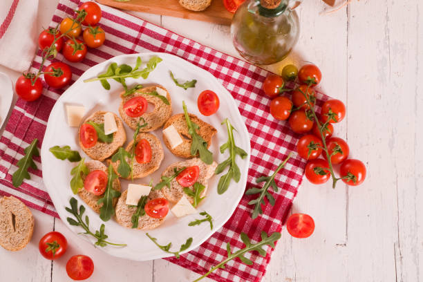 istock Friselle with cherry tomatoes and arugula. 1462118065