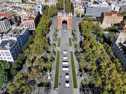 Barcelona aerial view. Cityscape with triumphal arch (Arc de Triomf) and Passeig de Lluis Companys boulevard.