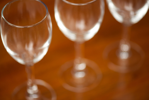 3 wine glasses line up.
