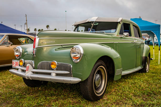Detail of the Art Deco influenced radiator grille of a postwar American car.