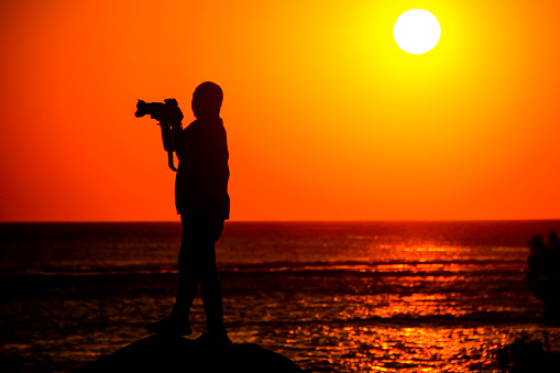 Enjoy the sunset on the beach lampuuk Aceh