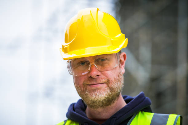 istock Portrait of construction worker in protective workwear on building site 1462138000
