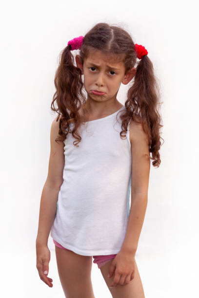 Pouting child looking at camera