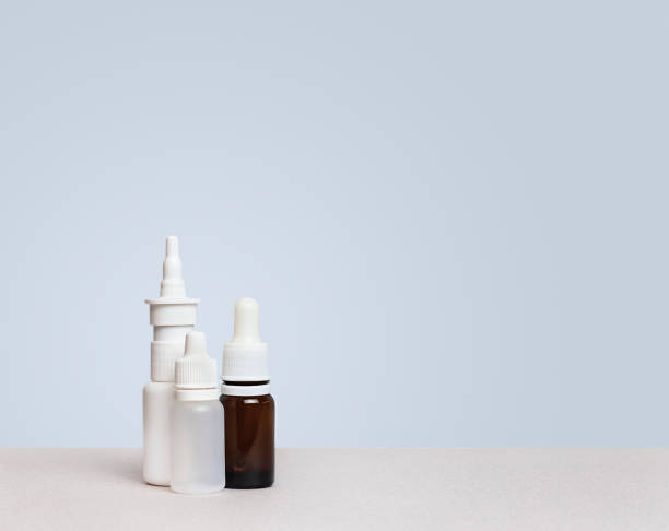 istock bottles and sprays are on the table on a blue background 1462140217