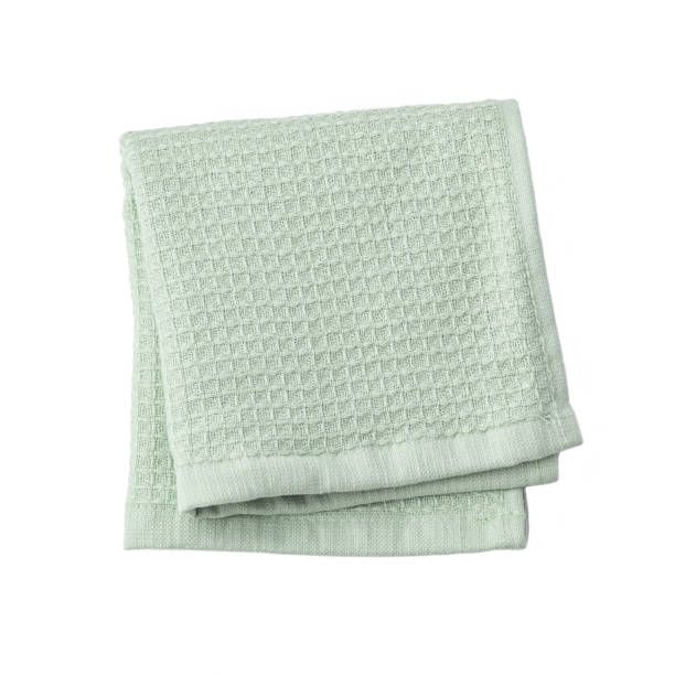 istock Green folded bath towel isolated on white background, top view 1462140889