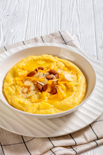istock corn grits with butter, vegan cheese, and almonds 1462145810