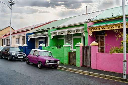 traditional architecture in Cape Town, South Africa, colorful houses with metal lace Dutch motifs