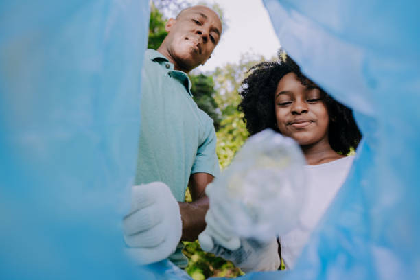 istock Throw recycled material in the trash 1462151886