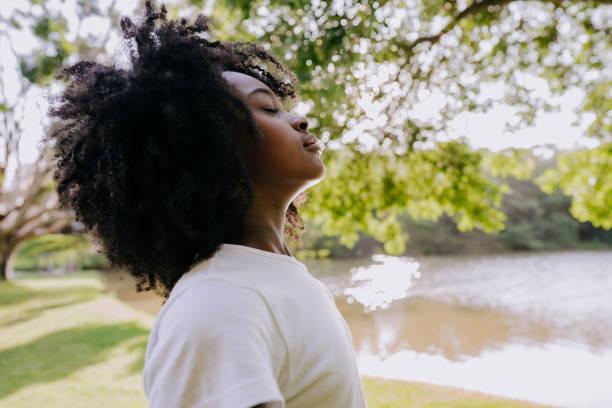 istock A child breathing clean air in nature 1462151904
