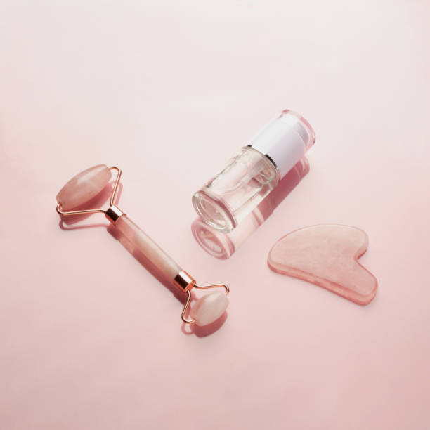 istock Gua sha massage scraper, quartz roller and liquid gel cosmetic product 1462153924