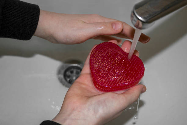 istock The child washes his hands with heart-shaped soap. 1462154471