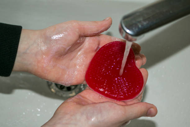 istock The child washes his hands with heart-shaped soap. 1462154482