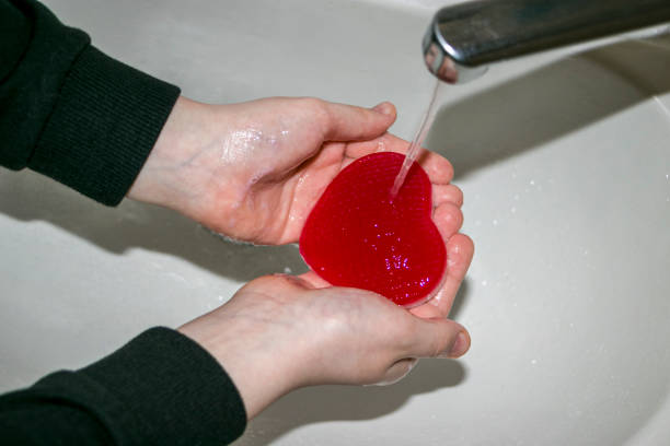 istock The child washes his hands with heart-shaped soap. 1462154492