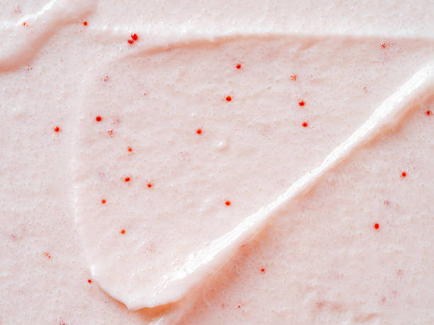 istock Scrub smears. Pink exfoliating body polish texture 1462163826