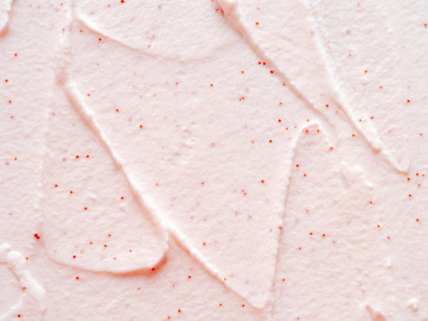 istock Scrub smears. Pink exfoliating body polish texture 1462163945